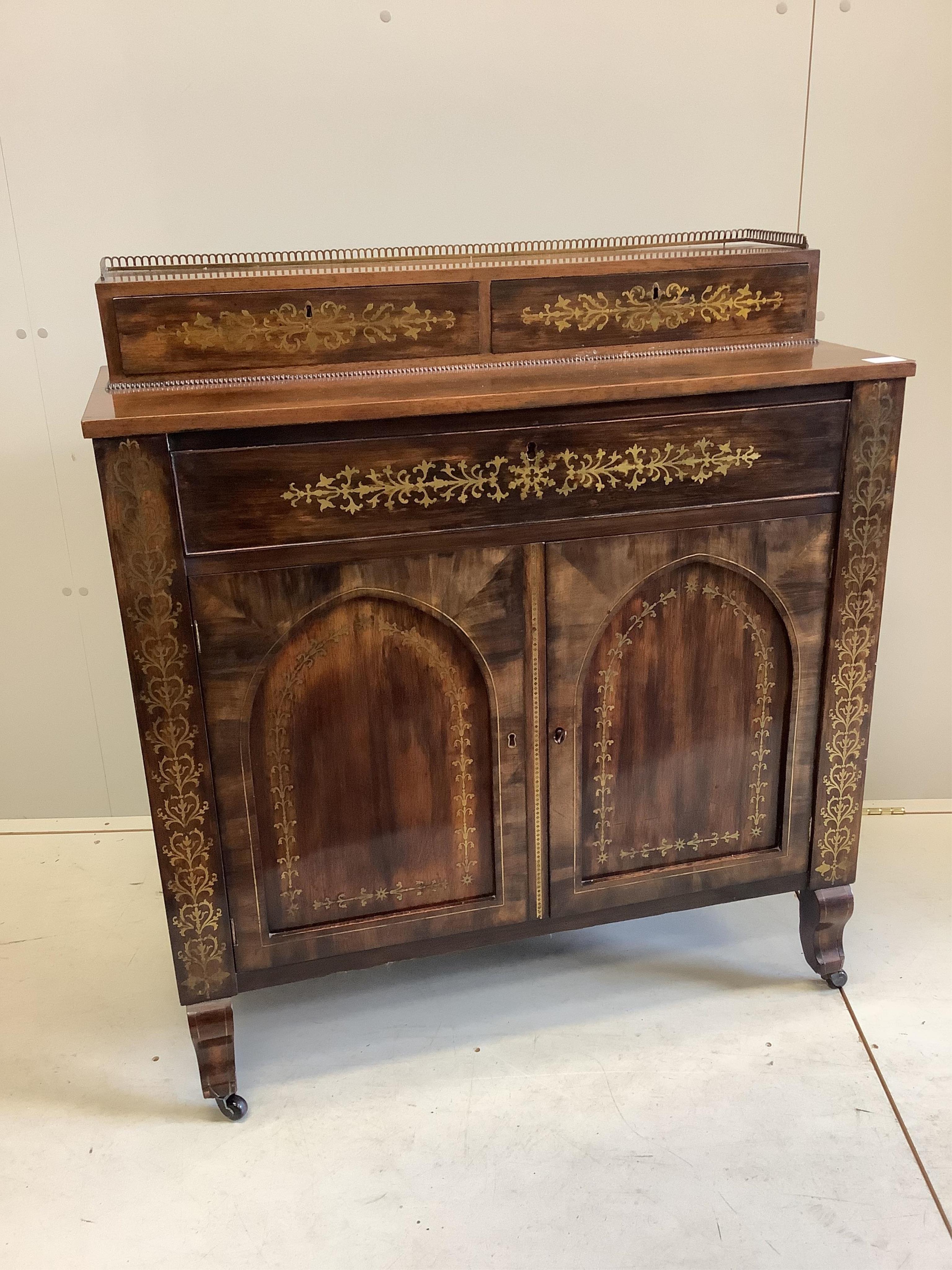 A Regency cut brass inlaid rosewood secretaire cabinet, width 93cm, depth 39cm, height 101cm. Condition - fair